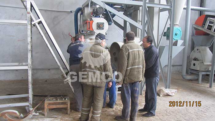 GEMCO worker on-site establishing pellet plant